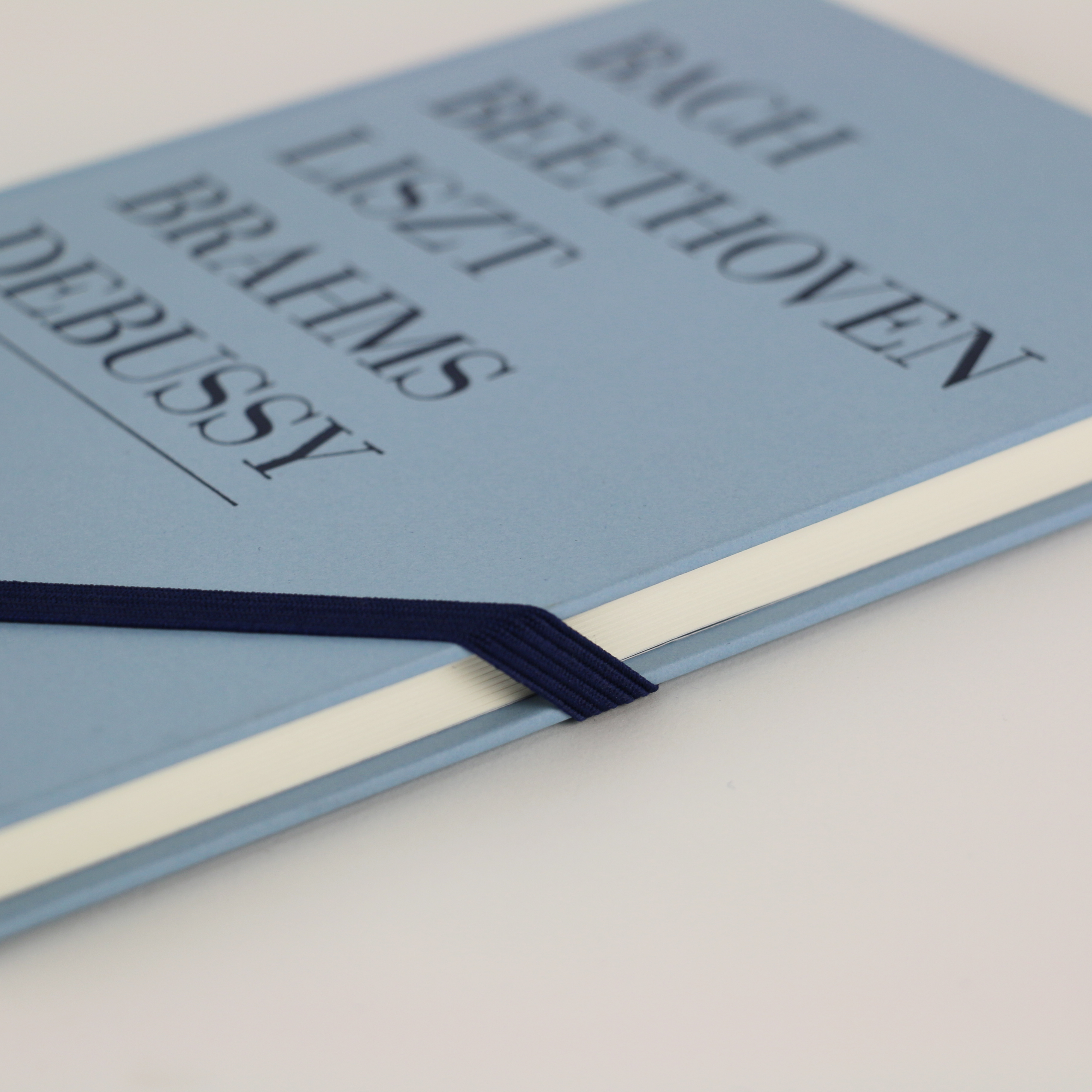 Lined inner pages with a light blue cover